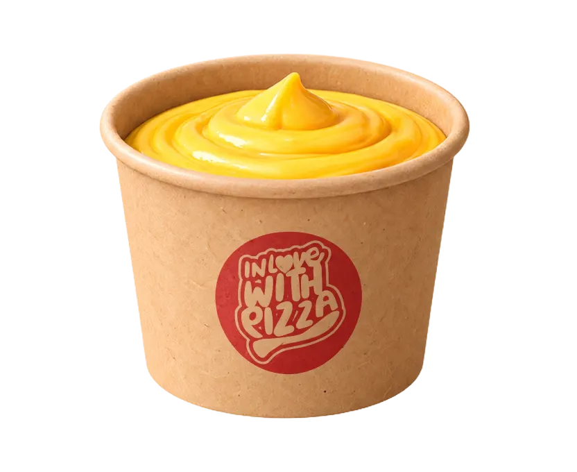 Becher mit goldgelber Chili-Cheese-Sauce
